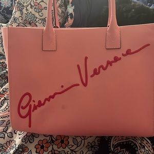 Pink Versace signature tote bag.